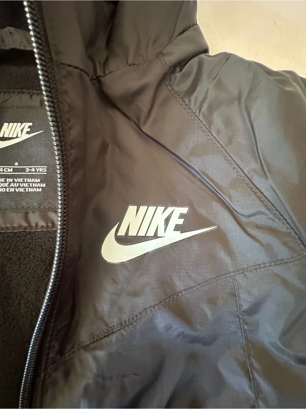 Nike Youth Black Hooded Puffer Jacket with White Swoosh